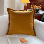 Decorative cushion made of linen look with hand-tied fringes and cross-stitch detail