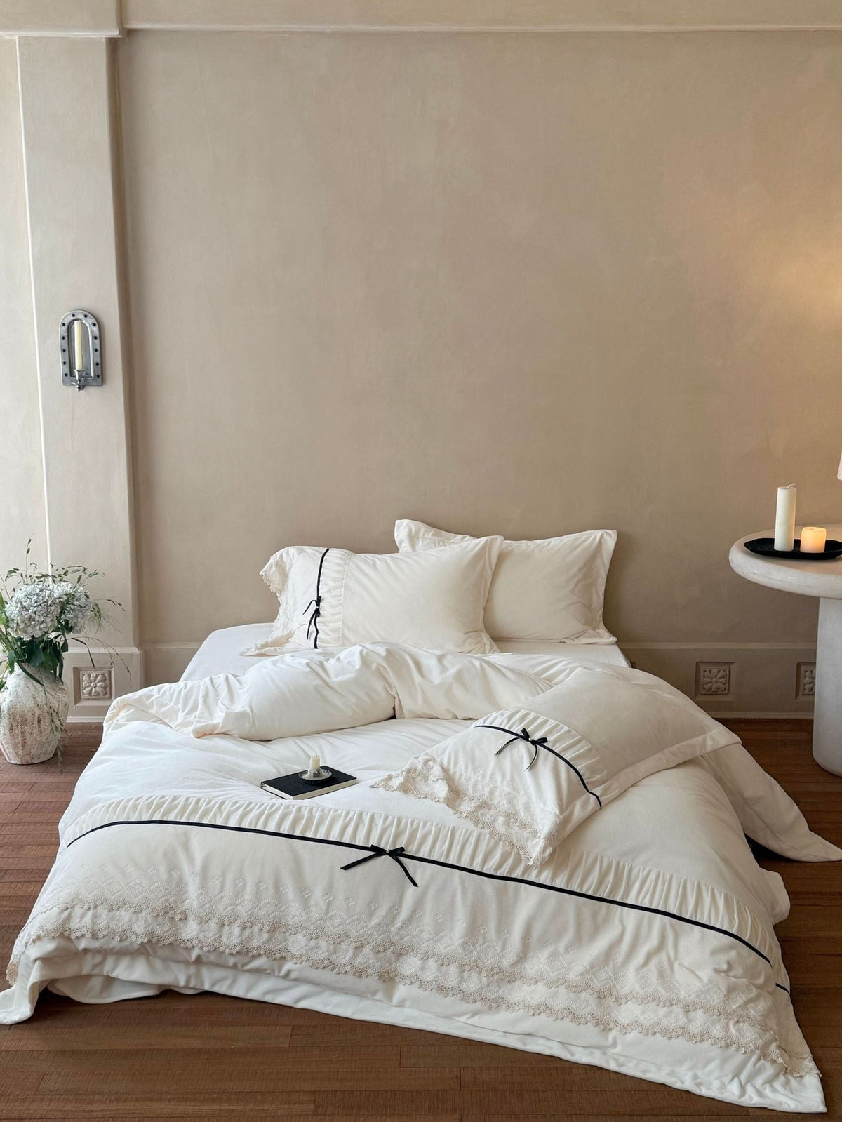 Romantic cotton satin bed linen set with ruffled hem, lace trim and decorative ribbons Kalsten