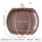 Disposable paper plates in pumpkin shape with spooky face design