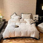 Bedding set made of cotton satin with mini heart embroidery and contrast piping Kalsten