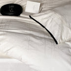Bedding set made of cotton satin with bamboo jacquard and contrasting piping
