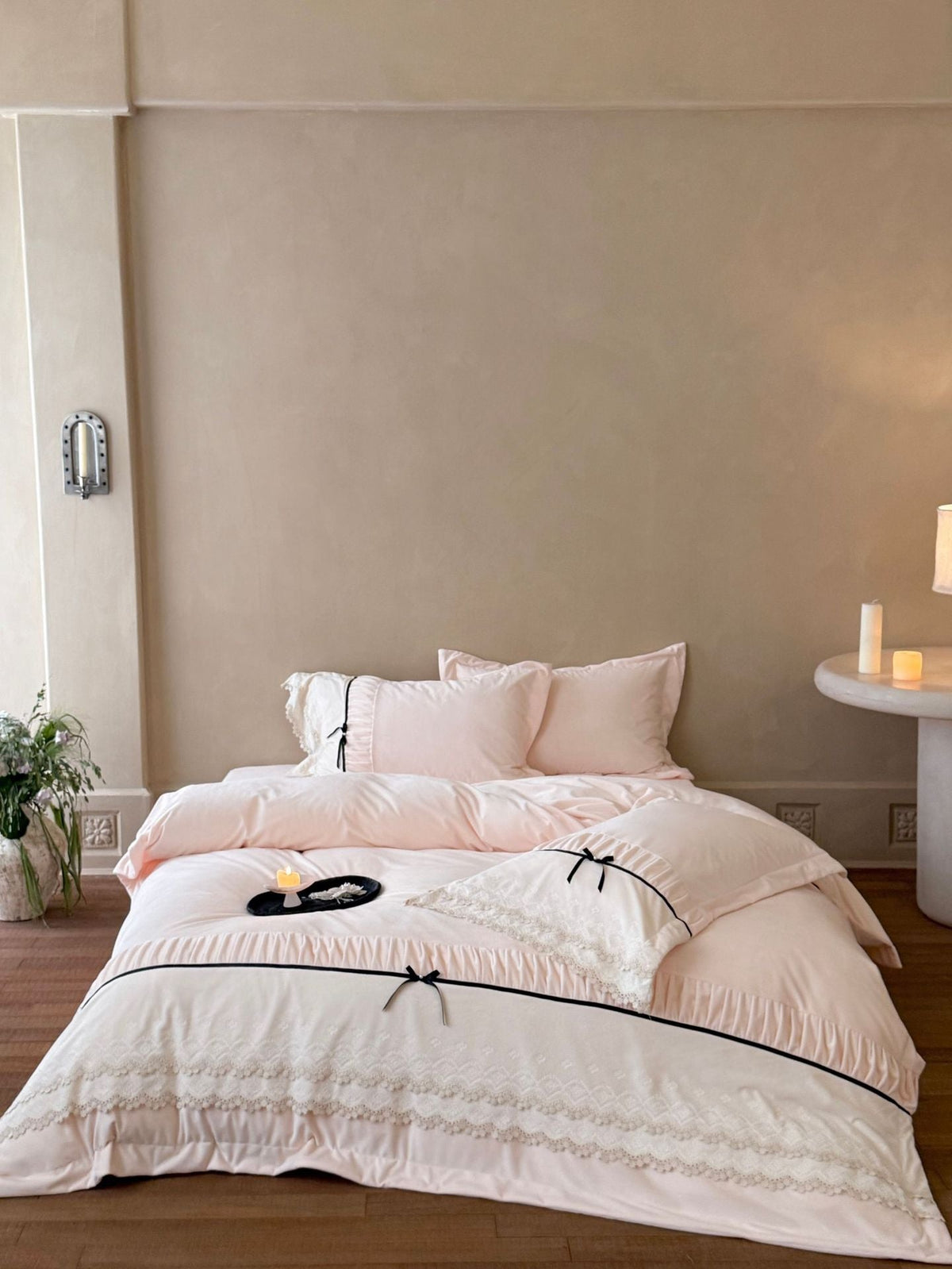 Romantic cotton satin bed linen set with ruffled hem, lace trim and decorative ribbons Kalsten
