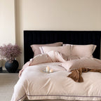 Premium bedding set made of breathable cotton blend with contrasting piping
