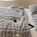 Faux fur blanket with ribbed structure design and velvety soft pile