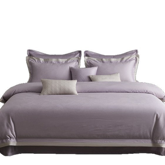 Premium duvet cover set with subtle jacquard structure and decorative ribbon Kalsten