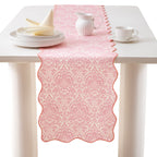 Damask-style table runner with curved wave edge and fine ornamental print Kalsten