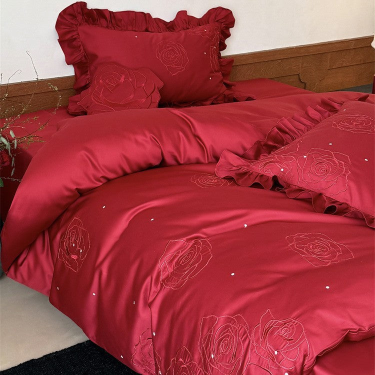 Satin bedding set with rose embroidery, ruffled pillow and decorative pillow Kalsten