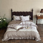 Elegant bedding set in vintage romantic style with lace applique, ruffle, and satin edging