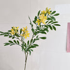 Decorative artificial flower branch with delicate flowers