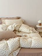 Bedding set made of cotton gauze with ruffled trim and fine bow print