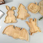 Christmas tree-shaped serving board made of solid wood with carved groove