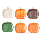 Disposable paper plates in pumpkin shape with spooky face design