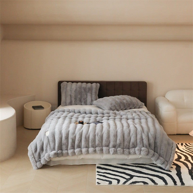 Faux fur blanket with ribbed structure design and velvety soft pile