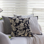 Square cushion cover with subtle herringbone texture and surrounding piping seam Kalsten