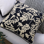 Square cushion cover with subtle herringbone texture and surrounding piping seam Kalsten