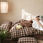 Checked cotton bedding set with decorative ribbons, ruffles, and subtly embroidered detail