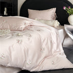 Satin bedding set with floral relief embroidery and velvety shine Kalsten