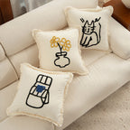 Woven decorative pillow cover with embroidered café motif and decorative fringe edge Kalsten