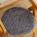Round seat cushion made of dense artificial fur with comfortable padding and anti-slip base Kalsten