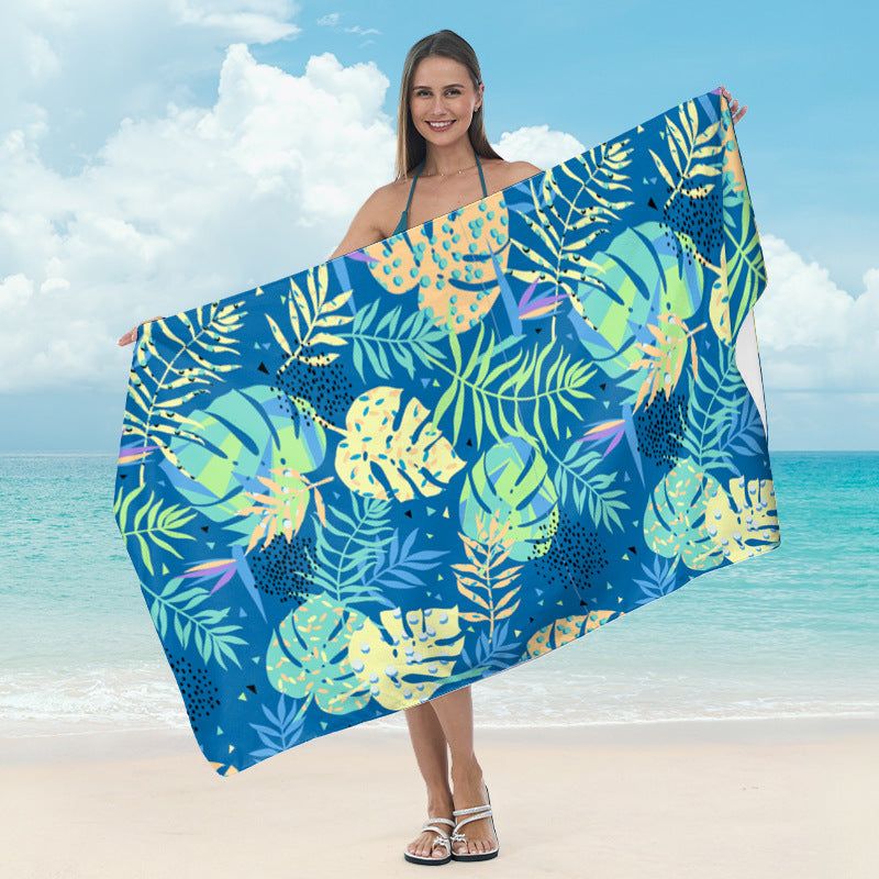 Beach towel with tropical leaf design Kalsten