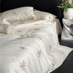 Satin bedding set with floral relief embroidery and velvety shine Kalsten