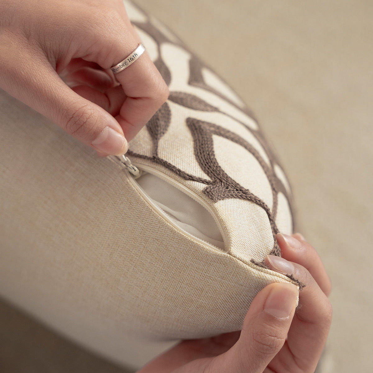 Embroidered decorative pillow in linen look with paisley ornament and relief embroidery Kalsten