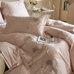 Satin bedding set with floral relief embroidery and velvety shine Kalsten