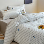 Reversible cotton satin bedding set with fine stripe pattern and cute cat embroidery
