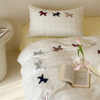 Children's bedding set made of cotton with embroidered dog appliqués and check pattern Kalsten