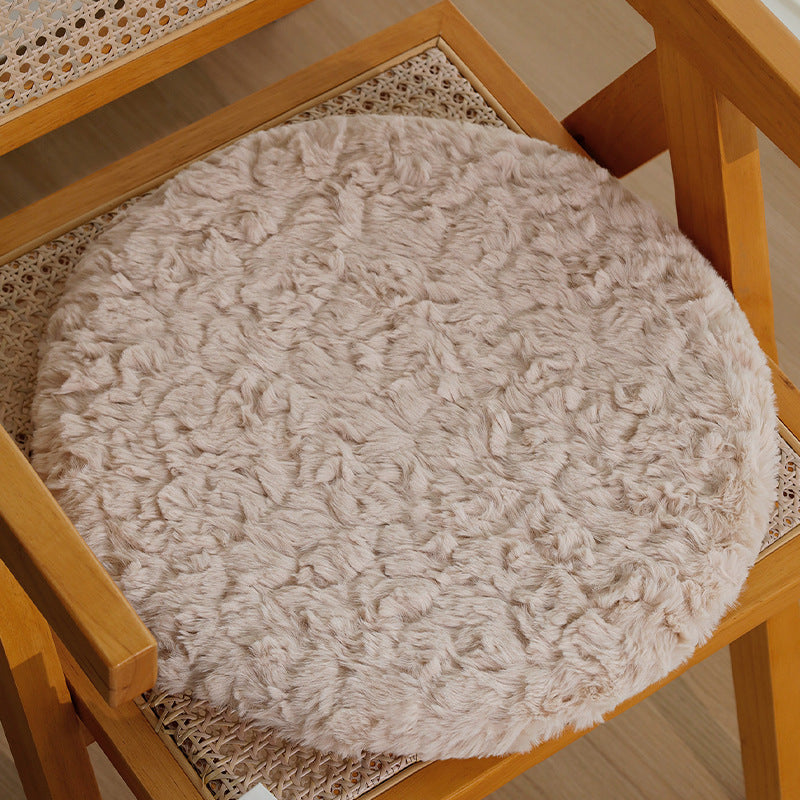Round seat cushion made of dense artificial fur with comfortable padding and anti-slip base Kalsten