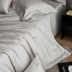 Premium cotton satin bedding set with subtle jacquard relief and fine hem