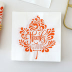 Disposable paper plates in pumpkin shape with spooky face design