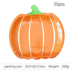 Disposable paper plates in pumpkin shape with spooky face design