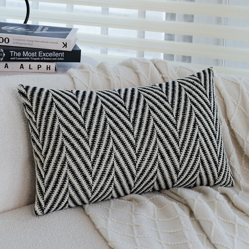 Square cushion cover with subtle herringbone texture and surrounding piping seam Kalsten