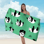 Beach towel with tropical leaf design Kalsten