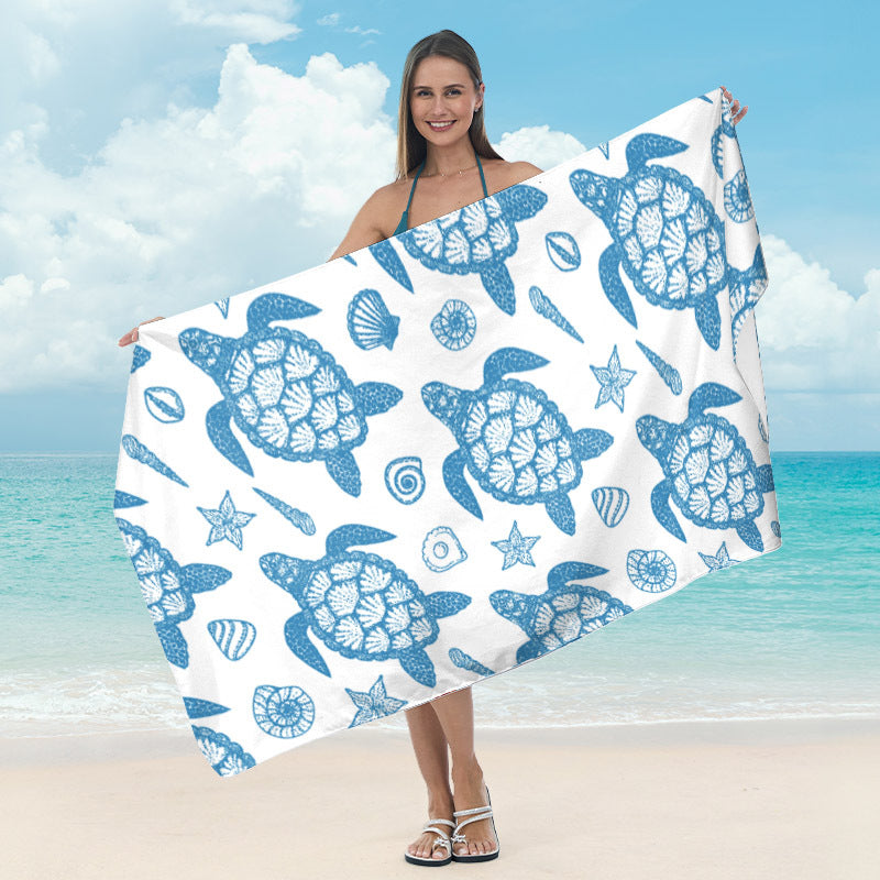 Beach towel with tropical leaf design Kalsten