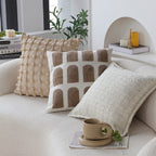 Square decorative pillow cover with tufted grid relief and tassel appliqués Kalsten