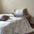 Bedding set made of cotton satin with woven butterfly jacquard and contrasting border