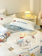Children's bedding set made of soft cotton blend with embroidered astronaut and rocket motifs