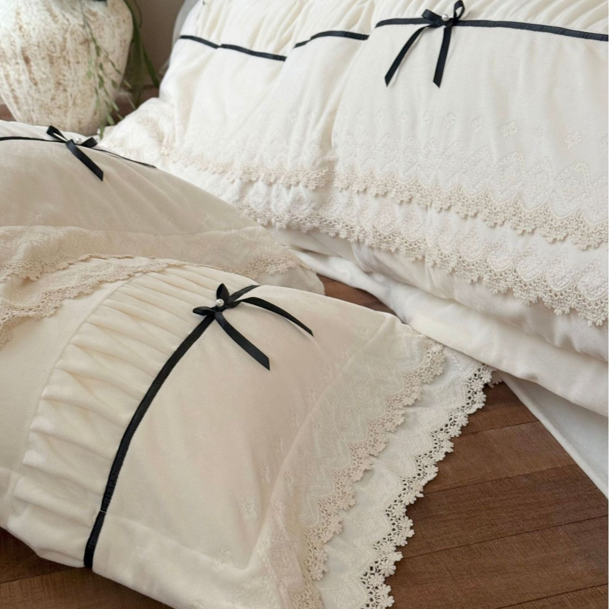 Romantic cotton satin bed linen set with ruffled hem, lace trim and decorative ribbons Kalsten