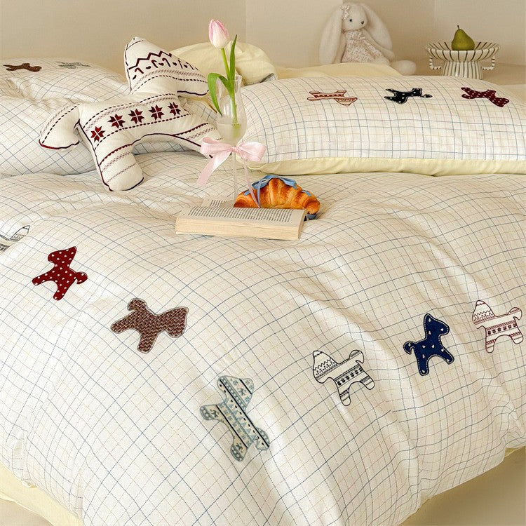 Children's bedding set made of cotton with embroidered dog appliqués and check pattern Kalsten