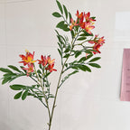 Decorative artificial flower branch with delicate flowers