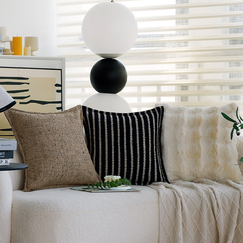 Square decorative cushion cover made of coarse woven bouclé with fine piping Kalsten