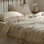 Washed linen bedding set with fringe trim and natural texture