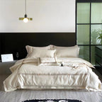 Exclusive satin bedding set with fine piping and monogram embroidery