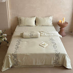 Elegant bedding set made of cotton satin with floral embroidered border and decorative roll cushion Kalsten