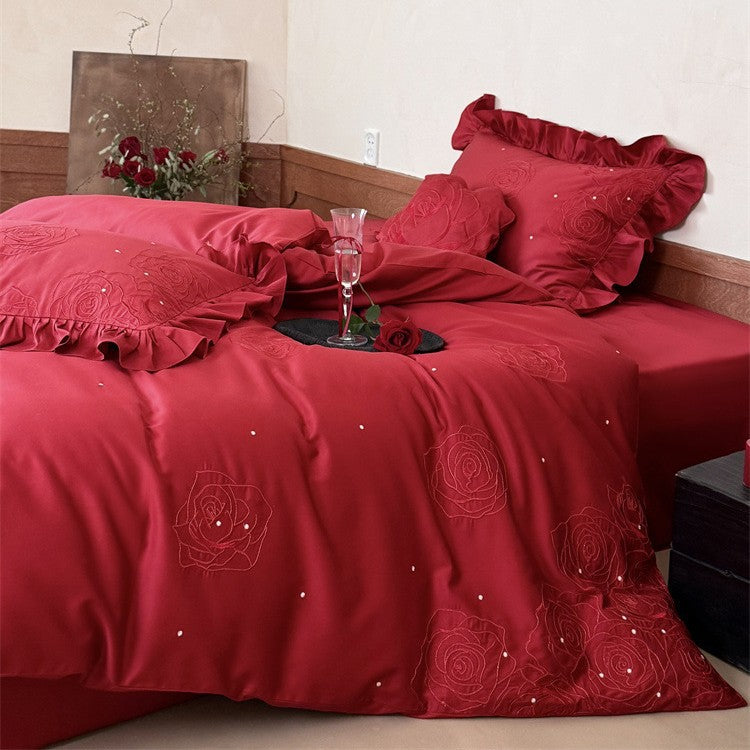 Satin bedding set with rose embroidery, ruffled pillow and decorative pillow Kalsten