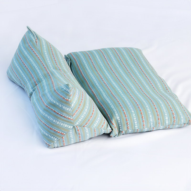 Neck support pillow with buckwheat hull filling