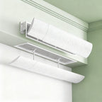 Air conditioning wind deflector for ceiling cassette